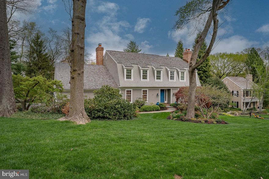 Welcome to Ravenscliff's epitome of elegance and comfort - a Main Line home that embodies luxury living amidst stunning landscapes.  Nestled within this sought-after community, this exquisite residence boasts many features that redefine modern sophistication.  As you arrive, you're greeted by meticulously designed landscaping that frames the home perfectly.  Stepping inside, a handsome foyer sets the tone with its spacious layout and tasteful decor.  The fireside living room offers a haven for relaxation, enhanced by ample natural light and premium finishes.  The nicely sized dining room beckons for memorable gatherings with family and friends.   A handsome 1st-floor office provides privacy and functionality when working from home.  Prepare to be captivated by the custom kitchen - a culinary dream equipped with top-tier appliances, bespoke cabinetry, and sleek countertops all flooded with tons of natural light.  An elegant powder room, mudroom, and laundry room complete the first floor.  Upstairs you'll discover a primary suite of your dreams! The timeless elegance of the marble bath epitomizes luxury, boasting lavish amenities and designer touches that elevate everyday routines into indulgent experiences.  A spacious closet is conveniently located off the bath for easy living.  An additional 3 nicely sized bedrooms and 2 full baths complete the second floor. The finished lower level with a full bath offers versatile space for recreation, entertainment, or accommodating guests.  A separate unfinished section provides ample storage.  Outside, the allure continues with meticulously landscaped grounds that complement the architectural beauty, offering outdoor spaces designed for leisure and enjoyment.  From every angle, this charming home showcases Ravenscliff's natural beauty.  This wonderful location is just minutes from shops, restaurants, and the train station in the charming town of Wayne. Easy access to Center City, airport, corporate centers, parks, trails, and highly-ranked Radnor schools.  Showings begin April 25th at noon - schedule your private tour today!