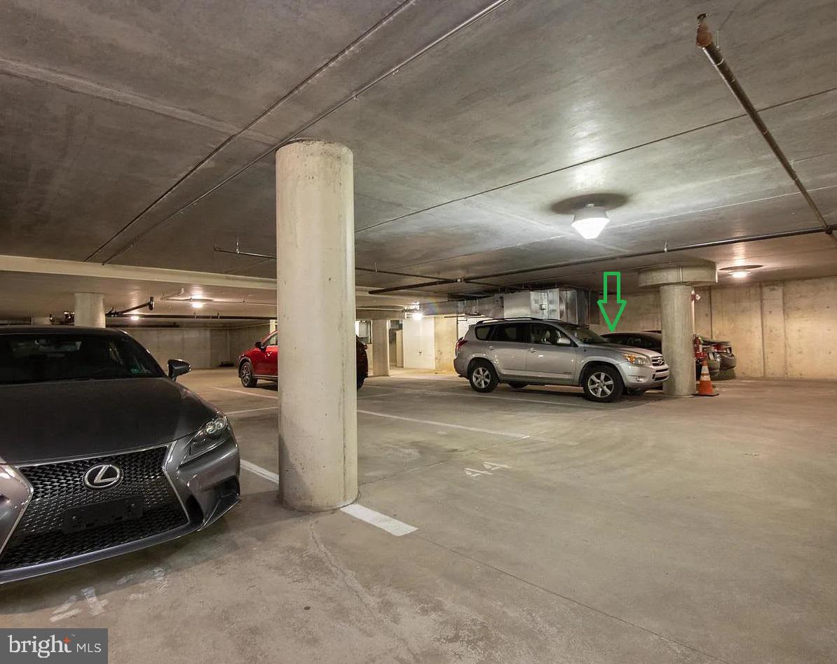 Separately deeded parking space in Lofts 1352 Lower parking garage. 24/7 security guard and cameras. Condo offers EV charging installation option for additional investment amount. Space is huge can fit 6ft bed 4 door pickup + Motorcycle. Space is tenant occupied until September 2025. Access through Lobby with elevators or through entrance on Kater street.