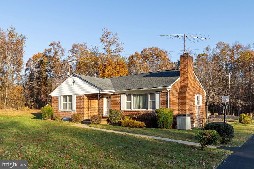 You will not want to miss this well-built all brick rambler on one acre.  This home is a quality-built home with 3 bedrooms and 1 full bathroom.  The kitchen has ample space for a kitchen table and the living room has a beautiful wood burning fireplace.  Gorgeous hard wood floors throughout the main level.  The lower level boasts a second kitchen area, gathering place and lots of extra space.  The open yard is well landscaped and perfect for family gatherings.  A large storage shed is available for all of your tools and toys!  This is a must-see property.