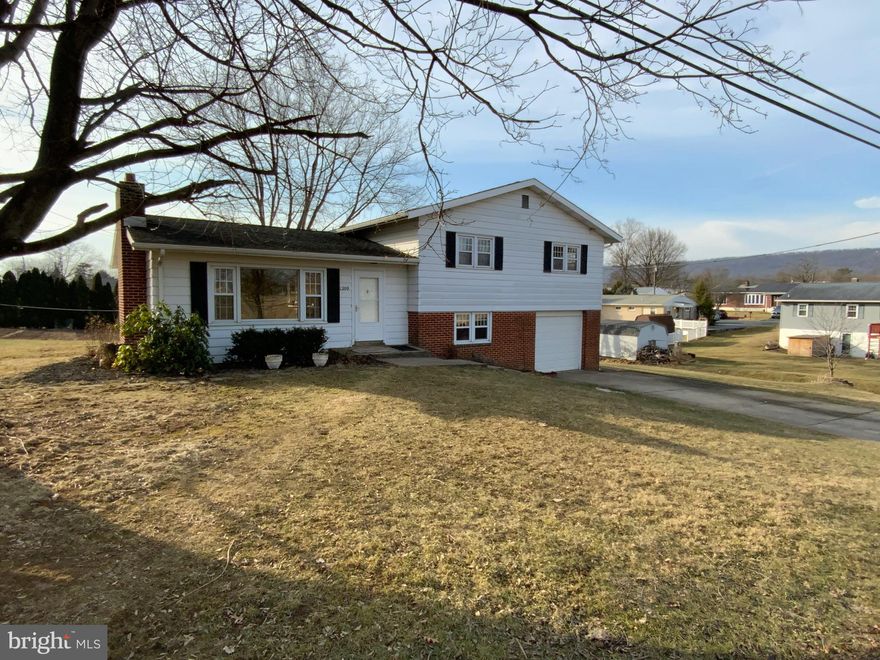 Location, Location, Location!  On a corner lot, this 4 bedroom, split level home on .29 acres is located right across from the sports fields of Linglestown Middle School. A must-see home featuring a large living room with lots of natural light, a beautiful cherry kitchen, 1.5 baths and spacious bedrooms.    A lower-level family room plus a basement and an oversized one car garage complete the package.   The lot located behind the house on Mimosa Street, is also for sale for $50,000, which would make this sit on over a half-acre.  Lot is MLS ID: PADA2009596.   Please call to see this home today!