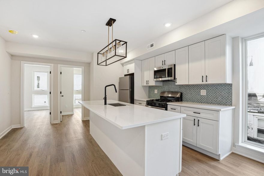 Welcome to 138 Tasker St, a brand-new construction building offering modern living at its finest. This beautifully designed unit features a spacious layout, hardwood floors, and high-end stainless steel appliances—including an in-unit washer/dryer, dishwasher, garbage disposal, microwave, and oven/stove. Enjoy sleek, contemporary bathrooms, and large windows throughout the unit that bring in abundant natural light, creating a warm and inviting atmosphere.  You are just steps from Dickinson Square Park and the Delaware River Waterfront, as well as tons of vibrant cafes and restaurants. Parking is available for just $150/month, a convenient price with I-95 just a few minutes drive away. Pets are welcome—cats with a one-time $350 non-refundable fee, and dogs with a $500 non-refundable fee (size and breed restrictions apply). Don’t miss the opportunity to live in one of Philly’s most desirable neighborhoods!