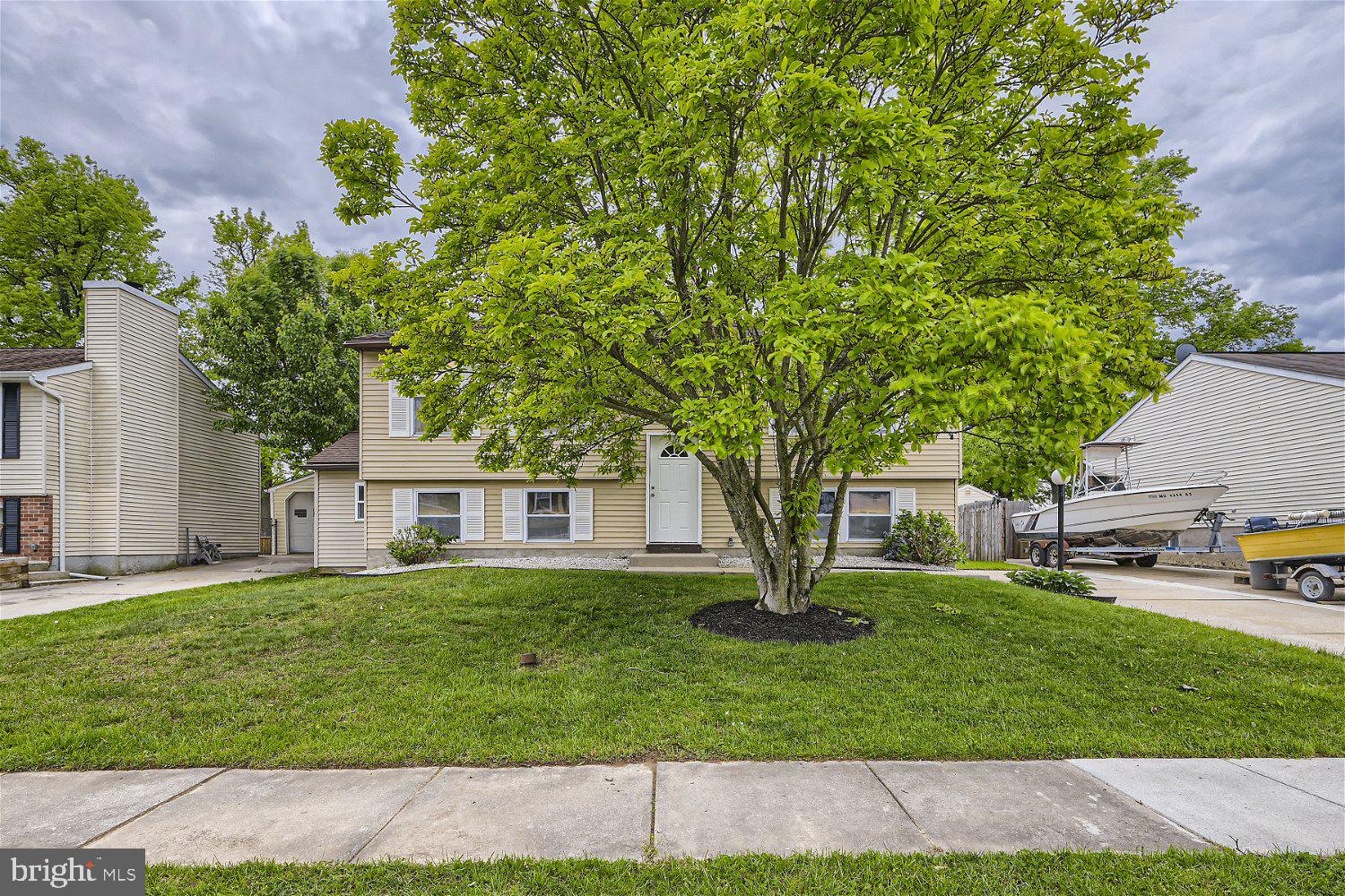 Offer deadline is Monday 05/15/2023 at 7PM. Thank you everyone who showed!
Move-in ready 3BR/2BA split Ranch located on a spacious lot in Baltimore County. Pull into the double wide, extra long driveway and make your way to the door into your forever home. The split entry leads up to the main floor or down to additional living space. On the main floor is a large living room beaming with tons of natural light, a spacious dining room open to the amazing kitchen making for the ideal entertainment space. The open concept kitchen boasts plenty of cabinets finished with crown moldings, black stainless appliances, granite countertops with a complementing backsplash, and an island. From the dining room, step through sliding doors into an oversized sun room offering views of the stunning yard. The sun room boasts a vaulted ceiling and three walls of windows allowing for tons of natural light. Completing the main floor are two bedrooms, a spacious primary, one secondary, and a full bath. The lower level is finished with two bedrooms, a large family room, laundry, storage, and a walk-out to the yard. The fenced yard is an entertainer's dream with a large patio that surrounds an inground pool, green space, and a shed. This home is move-in ready so much to offer new homeowners. Imagine all this and in close proximity to shopping, restaurants and commuter routes.