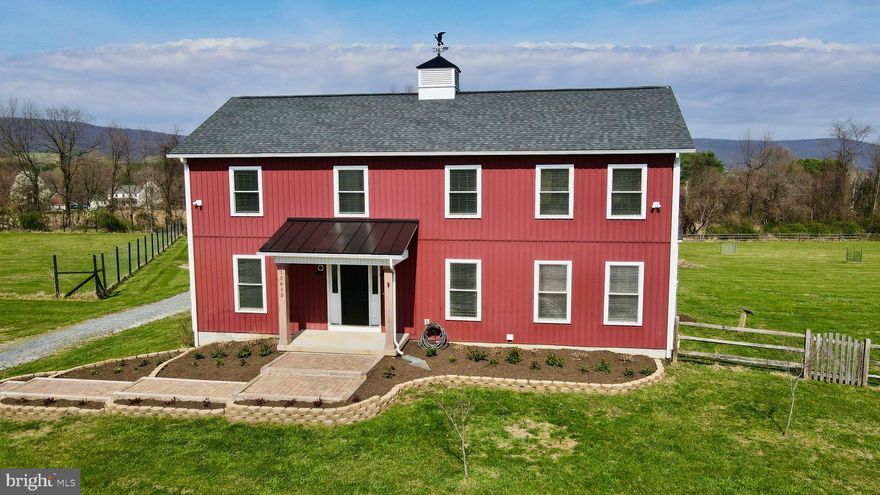 Welcome home to 15615 Whispering Knoll Court. A stunning 5-bedroom, 3.5-bath retreat nestled on 3.07 private acres in the heart of Hillsboro. Built in 2017, this thoughtfully designed home offers the perfect blend of space, comfort, and modern updates. Situated amongst the beautiful wineries and rolling countryside that Loudoun County is renowned for, and just a short drive to the charming towns of Purcellville and Round Hill, the location is as special as the home itself. Step outside to your brand new screened porch (2025) and take in the picturesque, fully fenced yard complete with a garden and newly planted trees; your own private sanctuary. Inside, the grand two-story living room with gas fireplace sets an impressive tone. Two primary suites (one on the main level and one upstairs, each with en suite baths) offer incredible flexibility for multigenerational living, guest accommodations, or simply planning for the future. The well-appointed kitchen features a large island, granite countertops, generous cabinet space, and stainless steel appliances. Fresh carpet and paint (2026), new washer (2025), new dishwasher (2025), and new microwave (2023), and all other appliances and major systems believed to be 2017.  The detached 2-car garage and an 800+ sq ft unfinished basement round out this exceptional property and provide so much room to grow. You must see this rare Hillsboro gem!