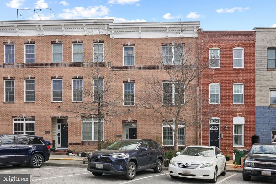 *Agents if your clients are interested in the home, Sellers have set offer deadline for Tuesday 4/8 at 12* 
Luxurious Townhome with 4 Bedrooms, 4-Car Parking & Rooftop Oasis in Prime
Canton Location

Welcome to 619 S Luzerne Ave, a one-of-a-kind 23-foot-wide end-of-group townhome offering
the ideal blend of space, luxury, and location in the heart of Canton. This rare property features 
4 true bedrooms, 3.5 bathrooms, and 4-car parking, including a climate-controlled, partially
finished 2-car garage and a 2-car parking pad—a true standout in city living.

The main level showcases a bright, open-concept layout flooded with natural light from
oversized windows fitted with custom wooden shutters. A spacious living and dining area with
exposed brick accents flows seamlessly into a chef’s kitchen featuring granite countertops,
double wall ovens, a five-burner gas cooktop, stainless steel appliances, garbage disposal, and
an oversized 10-foot island with wine storage, seating, and a mini fridge. Additional main level
highlights include dual-zone heating and cooling with Bluetooth Nest controls, a convenient
powder room, and a rear balcony—perfect for both entertaining and everyday ease.

Upstairs, you'll find three generously sized bedrooms, including a private owner’s suite with a
walk-in closet and spa-like en suite bath, as well as a full bath serving the secondary bedrooms.
At the top level, an expansive rooftop deck with a wood canopy offers breathtaking
panoramic views of the city skyline. A wet bar at the rooftop landing makes this the ideal
space for relaxing or hosting guests.

The lower level features a fourth bedroom with its own full bath—perfect for guests, a home
office, or an au pair suite. The climate-controlled garage offers not just secure parking, but a
versatile space for a home gym, indoor play area, or hobby zone.

With thoughtful design, premium finishes, and unbeatable proximity to Patterson Park, Canton
Square, top-rated schools, and more, 619 S Luzerne Ave offers a rare opportunity to own a
home that’s as functional as it is luxurious.