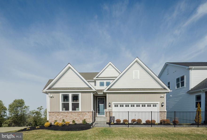 Welcome to the Camelot Classic Model by Lennar Homes, located in the desirable St. Charles Highlands Community. This stunning two-story design features a Next Gen® suite on the main level, complete with a private living room, kitchenette, bedroom, and bathroom—perfect for independent living.

The main home boasts an open-concept layout with a spacious family room, breakfast area, and multi-functional kitchen, ideal for both everyday living and entertaining. A three-car garage provides added convenience.

Upstairs, you'll find three generous bedrooms, including the luxurious owner's suite. The finished lower-level basement offers additional living space, featuring a recreation room, bedroom, full bath, and flex room to suit your needs.

Estimated Delivery: MAY 2026. Prices and features are subject to change. Photos are for illustrative purposes only—don’t miss the chance to make this your dream home!