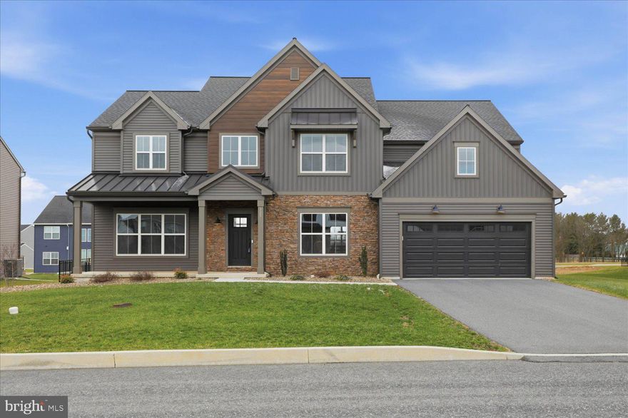 Gorgeous 3,867 SF home built in 2023 in the desirable Summer Layne subdivision within the Palmyra School District, offering exceptional curb appeal and a welcoming covered front porch. This light-filled, move-in ready 4-bedroom, 3.5-bath home features a spacious and thoughtfully designed layout, including a large second-floor family room.

Step inside to a stunning two-story foyer with a dual staircase. The main level boasts a family room with 10-foot ceilings, abundant natural light, and a beautiful gas fireplace with added windows. The family room flows seamlessly into the gourmet kitchen, complete with quartz countertops, tile backsplash, gas range, large island, ample cabinetry, a generous pantry, and a bright breakfast nook perfect for casual dining.

Entertain with ease in the formal dining room featuring a stylish accent wall and a butler’s pantry with beverage refrigerator. The main floor also includes a formal living room, private office, half bath, and a convenient mudroom with built-in lockers.

Upstairs, the owner’s suite offers a spacious walk-in closet and a luxurious en-suite bath with soaking tub, tile shower, and dual vanities. A second bedroom suite includes its own walk-in closet and full bath, while two additional bedrooms share a well-appointed full bath. A large laundry room and an additional second-floor family room provide extra flexibility and convenience.

The unfinished lower level offers excellent storage or the potential to create additional living space. An oversized two-car garage includes extra storage area.

This home is loaded with upgrades, including low-maintenance luxury vinyl flooring. Skip the wait and expense of new construction—this property already includes a fully fenced backyard, custom window treatments, refrigerator, beverage refrigerator, washer, and dryer.

Built by Landmark Builders and ideally located just 8 miles from Hershey Medical Center, with easy access to shopping, dining, and all Hershey attractions. Don’t miss this exceptional home!