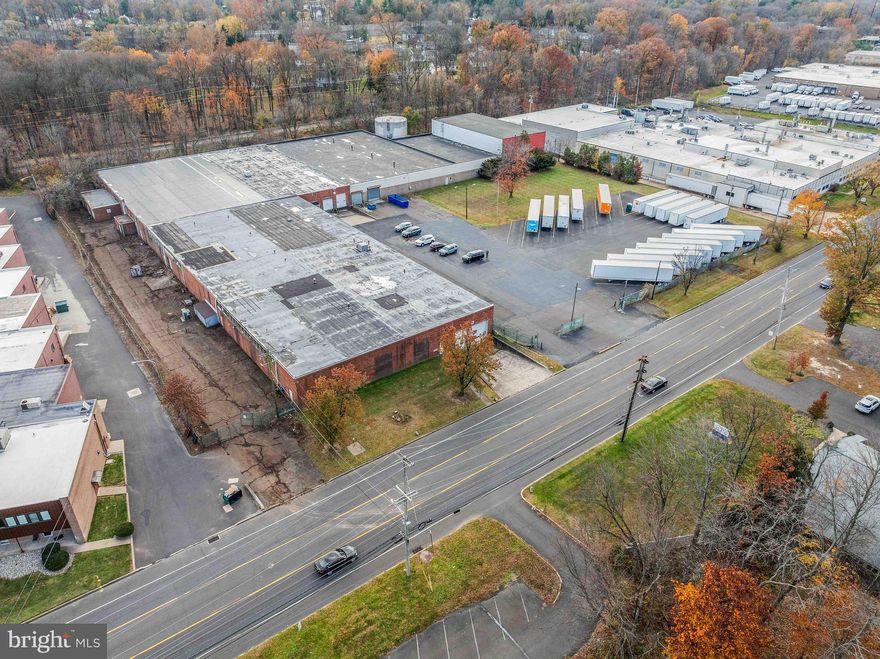 Prime industrial facility totaling ±98,600 SF on ±5.65 acres in a highly accessible Bucks County location. The property offers a mix of stabilized income and flexible owner-user opportunity with significant clear height, power, loading, and parking capacity.

Property Highlights Include
    ±98,600 SF single-story industrial building
    Clear heights range 14’–32’
    ±60,000 SF owner-occupied (includes ±5,000 SF office); seller open to short-term leaseback
    ±36,000 SF leased through June 2026 at $8.45/SF gross
    21 trailer parking stalls leased month-to-month at $4,000/month
    480V 3-phase power
    4 tailboard docks & 5 drive-in doors
    Parking for ±100 vehicles plus dedicated trailer parking
    Wet sprinkler system throughout

Ideal for investors seeking in-place income with upside or for companies requiring immediate occupancy with the ability to offset costs through existing leases. Strong functionality, flexible configuration, and a hard-to-find combination of clear height, power, parking, and loading in this submarket.