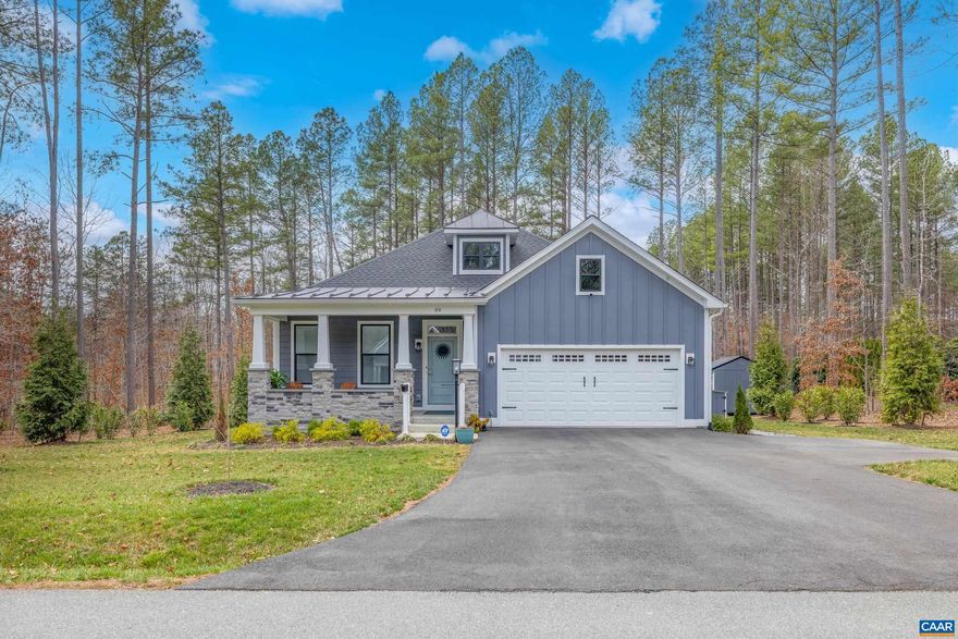 Move-in ready! Enjoy the ease of one-level living with convenient access to both Charlottesville and Richmond. The open floor plan and 9-foot ceilings create a bright, spacious feel throughout the home. The kitchen is designed for gathering and everyday living, featuring an oversized island, abundant counter and cabinet space, and a built-in pantry.  All three bedrooms offer the rare convenience of private ensuite bathrooms, while the generous primary suite includes a walk-in closet, dual vanities, frameless walk-in shower, and large tub. A large mudroom and laundry room help keep daily life organized.  Just three years old and lightly lived in, this home offers the benefits of newer construction without the wait or added expense. Step outside to an extended hardscaped patio backing to mature trees to provide privacy, as well as mature landscaping to round out your backyard oasis.  A matching storage shed offers additional storage, while the two-car garage and additional driveway spaces provide plenty of parking.  Thoughtfully maintained, beautifully situated, and ready for its next owner?quick move-in possible!,Granite Counter,White Cabinets