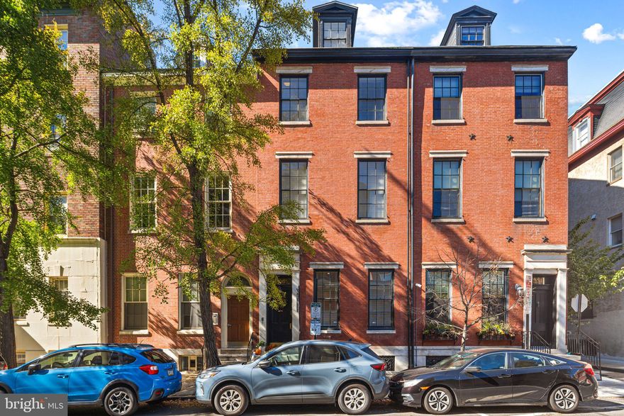 306 S 10th Street – Unit A

Experience the ideal fusion of modern luxury and timeless elegance in this completely renovated residence, set within a distinguished 1800 brownstone in the heart of Washington Square West—a fine example of the Colonial Revival era. Upon arrival, a grand double-door foyer welcomes you into a space where classic Old-World sophistication seamlessly blends with refined contemporary design.

Nestled in a picturesque, tree-lined neighborhood, this residence enjoys unmatched proximity to Philadelphia’s most coveted neighborhoods.

Upon entering this ground-floor residence at 306 S 10th Street, you’ll be immediately drawn to the soaring 15-foot ceilings, hardwood floors, and beautifully renovated bathrooms. The home thoughtfully preserves its architectural heritage with elegant crown molding, a restored original column, an impressive, oversized historic pocket door and a working fireplace with a restored marble mantel, all seamlessly complemented by modern upgrades such as granite countertops, a large kitchen island, new stainless-steel appliances, and a wine fridge. Additional highlights include RARE **TWO-CAR GATED PARKING**, a private outdoor retreat, brick courtyard and abundant closet storage throughout.

Each spacious bedroom is filled with natural light and oversized windows, contributing to the home’s bright and airy ambiance. Additional features include Nest thermostats, smart keyless entry with video intercom system and WiFi/phone access, security system, an in-unit washer and dryer, custom blinds, and private basement storage.

The building has been thoughtfully enhanced with a brand-new roof, offering the assurance of a 10-year workmanship warranty, a 30-year materials warranty, and a 5-year maintenance warranty—providing enduring peace of mind for years to come. Perfectly positioned in a true “Walker’s Paradise” (95 Walk Score) and “Rider’s Paradise” (Transit Score 100), this residence places the best of city living at your doorstep. Enjoy effortless access to the PATCO Eastbound and Westbound lines—just a six-minute stroll away—and nearby neighborhood gems such as Seger Park and Palumbo Playground, where the vibrancy of city life meets moments of tranquility.

This boutique property effortlessly blends Philadelphia’s historic charm with the comforts of modern living. Whether you’re a medical professional looking for a convenient home near Pennsylvania or Jefferson Hospital, an elegant in-town residence or a home within the highly regarded McCall school catchment, 306 S 10th Street #A presents a rare opportunity to own a move-in-ready, elegantly appointed home in one of Center City’s most sought-after neighborhoods.

For a closer look, please check out the 3D Matterport tour!

There is a 1% interest rate buy-down for the first year at *no additional cost​* by using the seller’s preferred local mortgage lender at Movement Mortgage. 1 year pre-paid full-coverage home warranty!