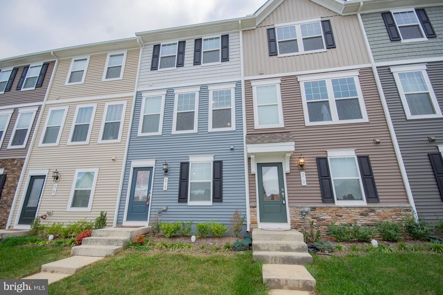 Welcome home to Presidents Pointe where comfort, style, and convenience come together beautifully! This 3-level interior townhome offers 2 bedrooms, 2.5 baths, and 1,386 square feet of thoughtfully designed living space that's perfect for those who want modern touches with an easy, low-maintenance lifestyle.  Step inside to find luxury vinyl plank flooring and recessed lighting that create a bright and inviting main level. The kitchen steals the show with sleek quartz countertops, a spacious island, and stainless-steel appliances. The dining area flows seamlessly.    Open living room with door leading to your private deck.  Upstairs, you’ll find cozy carpeted bedrooms, including a primary suite with a walk-in closet, attic access, and a tile-floor ensuite bath for that extra touch of comfort. The lower level adds flexibility with a family room and laundry area, plus access to your rear 1-car attached garage.  Location!  You can’t beat it!  Just a short walk to Potomac Marketplace with shopping and dining, and quick access to Rt. 9 and Rt. 340 for an easy commute to Virginia or Maryland.  Schedule your private tour today and make this beautiful home in Presidents Pointe yours before it’s gone!