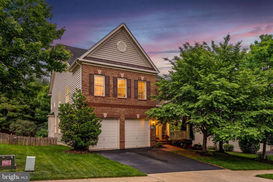 Nestled in the prestigious Moreland Estates, this exquisite Colonial-style residence offers a harmonious blend of luxury and comfort, perfect for those seeking an elevated lifestyle. Built in 2013, this home boasts a remarkable 5,186 square feet of meticulously designed living space, featuring six spacious bedrooms and five elegantly appointed bathrooms. Step inside to discover a warm and inviting atmosphere, enhanced by rich hardwood floors and tasteful crown moldings throughout. The open floor plan seamlessly connects the gourmet kitchen to the family room with a stone fireplace and coffered ceilings,  creating an ideal space for both entertaining and everyday living. The kitchen is a chef's dream, equipped with high-end stainless steel appliances, including a double oven, six burner cooktop and wine fridge.The expansive island, adorned with upgraded countertops, provides ample space for meal preparation and casual dining. Retreat to the luxurious primary suite, where you'll find a walk-in closet and a spa-like bathroom featuring a bidet toilet, soaking tub and a walk-in shower, offering a serene escape at the end of the day. Each additional bedroom is generously sized, ensuring comfort and privacy for all. The fully finished basement, complete with walkout stairs, adds even more versatility to this stunning home, including a 6th bedroom, full bath, gym and large rec room with built-ins. Did I mention the unique and fun hidden area behind the built-in bookcase?  Outside, the property is equally impressive, featuring extensive hardscape and beautifully maintained landscaping, complete with an underground lawn sprinkler system. Multiple outdoor spaces, including a screened porch, wrap-around deck, and patio, invite you to relax and entertain in style. The community pool offers a refreshing retreat during warm summer days, while the common grounds provide additional space for leisure and recreation. With an attached two-car garage and a prime location within a well-managed community, this home is not just a residence; it's a lifestyle. Experience the perfect blend of luxury, comfort, and convenience in this exceptional property, where every detail has been thoughtfully curated to create a true sense of home.