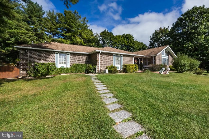 All on one level! Huge 5BR, 3.5ba rancher has an open floor plan - kitchen flows to family rm w/ fpl, sun rm, large DR & LR w/ vaulted ceiling. Loads of natural light! Updates include remodeled bath, new carpet & paint. MB w/ private bath & jet tub. Additions make total living area 3494 sq ft above grade. More space on fully finished lower level. Set on a landscaped lot at the end of a cul-de-sac.