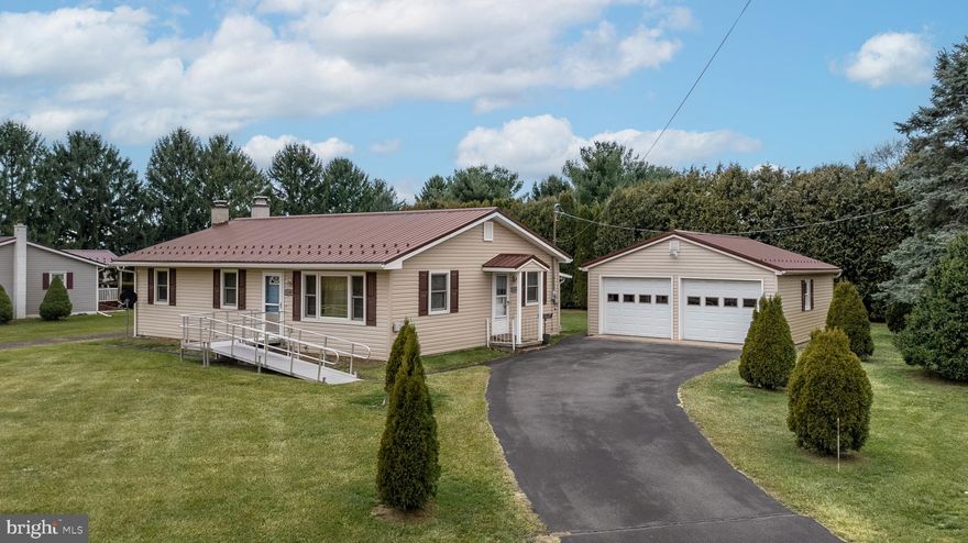 Open House: Sunday, January 25th, 2:00 PM -3:30 PM.  Your search for an easy, one‑floor living on a .43-acre flat corner lot in Bellefonte is finally over. This well‑built, meticulously maintained ranch home offers comfort & convenience.  In 2024, windows were upgraded to Andersen Renewal for seasonal use and energy efficiency. A metal roof, central air, and a sunroom overlooking the backyard add tremendous value and year‑round enjoyment. A new shed (12 x 19.5) with a garage‑style ramp provides excellent storage and accessibility.  The property includes two driveways—one leading to the oversized 2‑car garage (21 x 23) with a side door and workbench area, and a second driveway leading directly to the shed. Inside, the kitchen offers comfortable eat‑in dining, while the spacious living room provides a relaxing gathering space. Three bedrooms and a bath with a step-in shower complete the main level.  A full basement expands your possibilities with abundant room for a workshop, storage, exercise area, laundry, and more. Walk‑up Bilco doors provide access to the back patio and yard, and a chair lift is already installed to basement for added convenience if needed.  With only a few steps between the side entrance and the garage, this home is designed for practical, manageable living and is ready for your personal touches and to welcome you home.