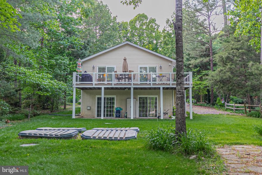 Fantastic Waterfront Home in Beautiful Lake Caroline ! Great views of the Lake from just about every room, home has lots of features & has room for everyone ! Nice Boat dock & boat lift is ready for your Boats.
2 story entryway with curved staircase leading to additional Bedrooms & Full Bath on the 3rd Floor. This Home has Storage Storage everywhere. Main floor has 3 bedrooms 2 baths, kitchen, family room, skylights, Vaulted ceilings & yes a Basement too! Bonus Room, another bedroom & 4th Full Bath.  Lake Caroline is a Full Service Lake with Power Boats, Jet Skis, water ski, wake board, pontooning. Bass Fishing tournaments every week, Club house, 2 sandy beaches, playgrounds & common areas all around the Lake. Lake Caroline is located just off I-95 between Ashland & Fredericksburg. Close to YMCA, Library, Shopping, Winery, Golf, Kings Dominion & Meadow Event, home of the Virginia State Fair & Secretariat birth place. Great Location !