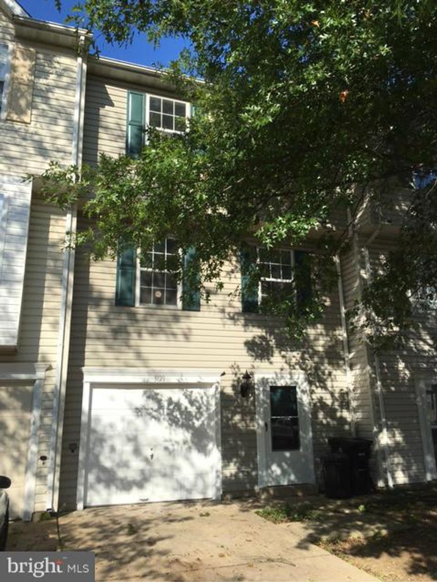 Beautifully renovated 3 level 3 BRs, 2 full, 2 half baths, 1 car garage TH w finished walkout basement & deck. New gourmet kitchen cabinets w/ backsplash, granite countertop, & SS appliances.  Nicely updated bathrooms. New features included ceramic tiles in basement, HVAC, water heater, W/D, carpet, freshly painted , fixtures & much more. Close to shopping centers, major hwys, and DC. A  Must See!