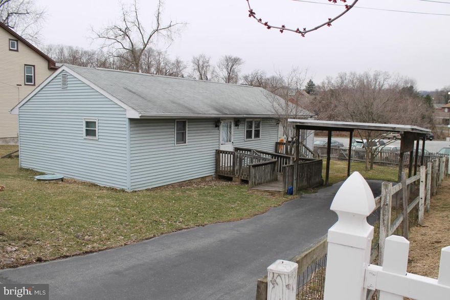 Mobile home with addition on its own lot, carport and shed, new water heater, large eat-in kitchen/dining area, mobile home built in 1970 and addition in 1991. Convenient to grocery and shopping. 1 year AHS Home Warranty.
