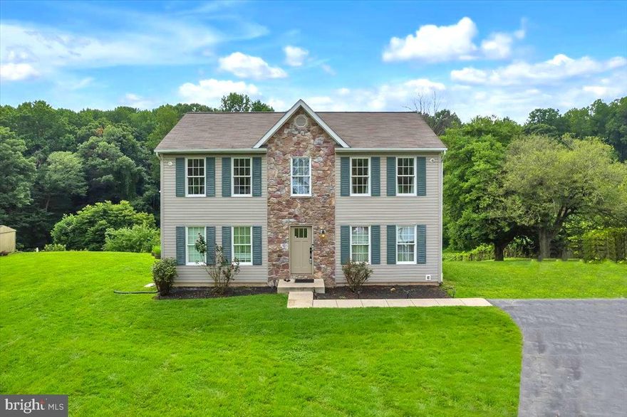 REDUCED PRICE! SELLER RELOCATING AND MOTIVATED. This home has Space for Everyone and Everything! Plus there’s NO HOA!! ---This Spectacular Custom Colonial Manor boasts 3 Finished Levels, 5 Spacious Bedrooms, 3 ½ Baths, Huge Eat-In Kitchen plus Separate Formal Dining Room, and both a Living/Family room for Entertaining. Best of all Soak in the Captivating Views of your Private 1.36 Acre Estate. ---This house is move in ready! ---Enter into the foyer area which features Wood floors throughout. ---The spacious updated chef-inspired kitchen features SS appliances (gas range), granite countertops, upscale cabinets, expansive center island which opens to the Sunlit Breakfast area. ---Convenient powder room located on the main level. ---Enjoy entertaining in your formal Dining room then gather in the spacious Living room for coffee and desert, then venture to the Family room (off the kitchen area) and relax with family/friends. ---Time for the real Entertaining on your maintenance-free enormous Deck with enough room for dining and lounging while overlooking the lush grounds of your picturesque 1.36 Acres. ---Head back inside to the Upper Level which features the Owners Suite that has a Huge Walk-in Closet and Private Full Bath w/Sep Shower; Double sinks and Sunken tub. ---Three (3) additional graciously sized bedrooms, full bath, and a laundry area. ---Lower Level was freshly painted; features Luxury Vinyl Plank floors; Can be an amazing In-law or au pair suite with sep rear entrance; or use this area as a Bedroom; Sep full bath. Truly perfect for Entertaining/Activities! ---Sep huge utility room with ample storage; 3yr young Commercial Water Htr; Gas furnace is for main/lower level; Sep HVAC for upper level. ---Walk-out and take in the peaceful surroundings while sitting around the fire pit enjoying the end of a perfect day. ---Solar panels: enjoy saving your hard-earned money by reaping the benefits of having solar power. The best part is there’s approx two years left until fully owned! ---Parking Galore!! Enter the Estate onto your Expansive Driveway with Ample Parking; Build your Dream Garage! ---Plenty of room for an In-Ground Pool oasis!