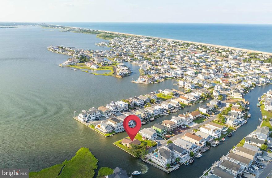 Imagine waking up to sweeping bay views, ending your days with stunning sunsets, and being serenaded daily with the peaceful rhythm of nature—all just a short stroll from the pristine beaches of Fenwick Island. Welcome to 61 Bayside Drive, a rare waterfront opportunity that offers the best of both worlds: serenity on the water and proximity to vibrant coastal amenities including guarded ocean beaches, restaurants, shops, and entertainment. Situated on a spacious 100' x 100' parcel, this property presents incredible flexibility. Whether you're envisioning your forever home, a luxury beach retreat, or an investment project, the possibilities are wide open. The lot can be subdivided into two buildable parcels, allowing you to build your dream home on one and sell or develop the other. The existing home is a charming beach retreat that has been lovingly maintained—perfect for enjoying the coastal lifestyle while you design your vision. Whether you hold onto both lots, build new, or explore development options, this is an opportunity you don't want to miss. Breathtaking views. Coastal convenience. Limitless potential. Make it yours.