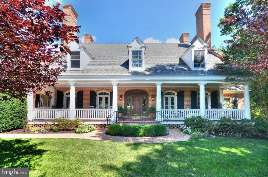 Custom-Built  Southern Living  Cape Cod Home by Mel Benhoff backing to Oregon Ridge Park.  This 6000+ sq. ft., 5 Bedroom, 5.5 Bath all-brick home features extensive custom millwork throughout, gourmet kitchen w/ Breakfast nook, finished walkout basement, 3 car garage, a huge front porch, real working shutters. Architecturally stunning 4-chimney brick parapet walls. Mays Chapel Elementary District.