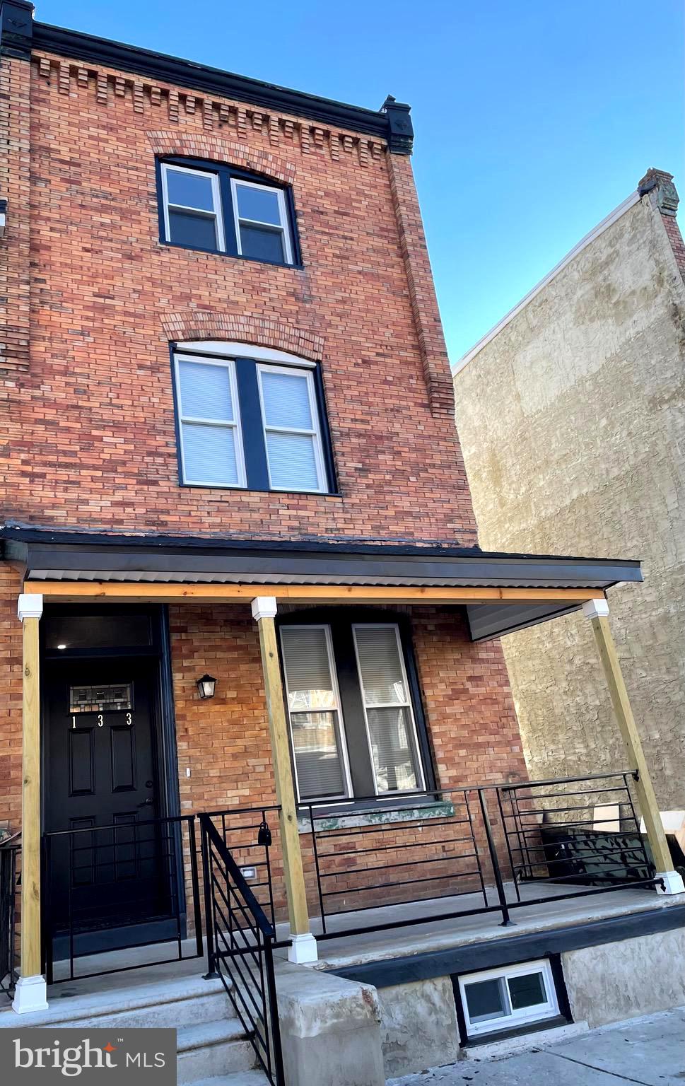 Nestled in the heart of West Philadelphia, this stunning three-story, 4-bedroom, 2.5-bath home is a perfect blend of modern luxury and historic charm. The exterior boasts a classic brick façade with detailed cornices, accented by a welcoming front porch framed by wrought iron railings and lush landscaping.
Step inside to discover an open-concept main floor flooded with natural light and a half bath. The gourmet kitchen is a chef's dream, featuring countertops, a spacious island, stainless steel appliances, and custom cabinetry.
The second level offers three spacious bedrooms with large closets and oversized windows. The full bathroom on this floor is elegantly designed. A convenient laundry area is tucked away, offering ease of living.
The third floor is dedicated to the luxurious master suite, a true retreat from the hustle and bustle. It features a sprawling bedroom with recessed lighting, and a walk-in closet. The en-suite bath boasts a spa-like atmosphere with a frameless shower.
The backyard is a private oasis, perfect for entertaining, and space for gardening or relaxing.
The home includes a fully finished basement, ideal for a media room, home gym, or office, and energy-efficient upgrades like new windows, HVAC, and smart thermostat.
Conveniently located near parks, shops, and public transit, this West Philadelphia gem offers the perfect balance of urban living and serene comfort.