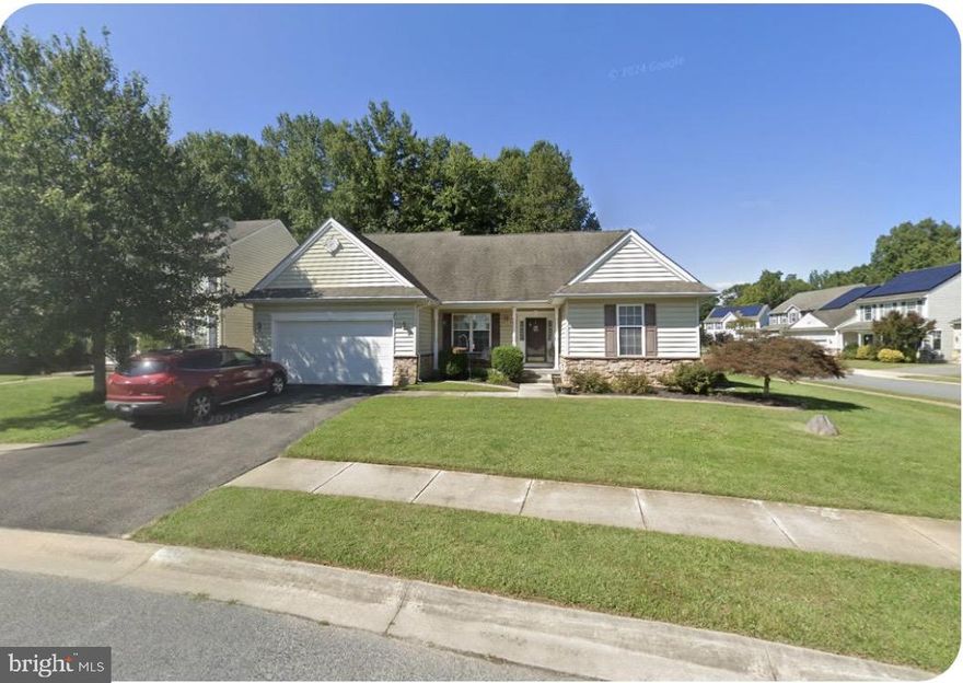 Well-maintained 3-bedroom, 2 full bath ranch home built in 2006, offering single‑level living on a corner lot in the Willow Oak Farms community. Open‑concept floor plan features a family room with gas fireplace, kitchen with adjacent dining area, and sunroom with sliding doors to a paved patio. The primary bedroom suite, located separately for privacy, includes two walk‑in closets and a spacious en‑suite bath with jacuzzi soaking tub and separate toilet room. Two additional bedrooms and a full hall bath complete the main level. Full unfinished basement spans the entire footprint of the home with 9‑foot ceilings, plumbing rough‑in for a future bathroom, and Bilko doors providing exterior basement access ideal for finishing, storage, or workshop use. Additional features include natural gas, central air conditioning, and access to a community park. Conveniently located near Route 1, shopping, dining, and the local mall. Quiet neighborhood setting.
