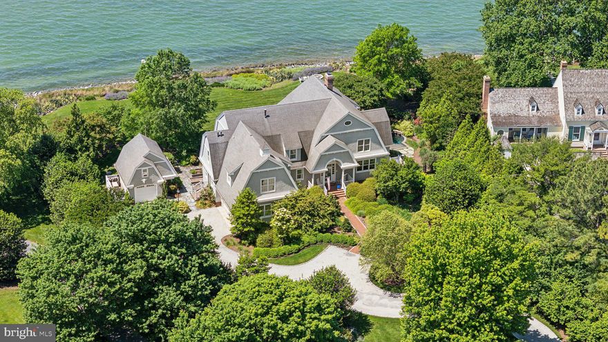 Discover unparalleled luxury and breathtaking waterfront living at this stunning estate, perfectly situated at the confluence of the Tred Avon and Choptank rivers, leading to the majestic Chesapeake Bay. This exclusive property boasts spectacular sunset views and offers a rare opportunity for discerning buyers to own a piece of paradise. Enjoy panoramic water views and serene sunsets from this elevated site, offering privacy and tranquility. The gourmet kitchen is a chef's dream, equipped with top-of-the-line appliances and premium finishes. The great room, designed to evoke the elegance of a ship, features soaring ceilings and expansive windows. The classic media room is perfect for entertainment, thoughtfully designed for movie nights and gatherings. Adjacent to the enchanting side grotto pool, the river room is ideal for relaxation and reflection.
The convenience of an elevator provides easy access to two en-suite bedrooms and a massive primary suite. Indulge in the lavish primary suite featuring a private balcony with sweeping views of the bay. For yacht owners, the property includes a 65' deeded boat slip with 8 ft MLW in protected Bachelor Harbor, complete with a floating dock, offering seamless access for your yacht. The private driveway adjacent to the boat slip ensures effortless arrivals and departures.
Experience the epitome of waterfront luxury and make this extraordinary estate your new home. Contact agent to schedule a private tour and discover the lifestyle you've always dreamed of.