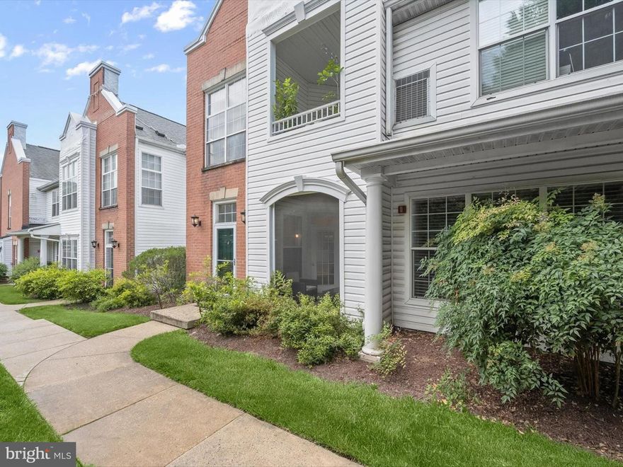 Welcome to 10742 Symphony Way #103, a beautifully appointed condo nestled in the highly sought-after gated community of The Whitney at Town Center. Step inside to discover a private screened porch that sets the tone for the open and airy floor plan, highlighted by 9-foot ceilings. The living room is anchored by a cozy fireplace, while the adjacent dining area features a tray ceiling and an elegant mirror accent wall. The kitchen offers stainless steel appliances and generous cabinetry, perfect for both everyday living and entertaining. The spacious primary bedroom includes a walk-in closet and an en-suite full bath. A second bedroom and full bath provide additional comfort and versatility. A one-car garage with interior access through the laundry room adds ease and extra storage, while recent updates like a new HVAC system offer peace of mind. Enjoy the convenience of low-maintenance condo living with all the perks of a vibrant community just steps from shops, restaurants, and entertainment. Stroll to local shops, dine at nearby eateries, catch a movie, or enjoy concerts at Merriweather Post Pavilion. With walking paths along the lake, parks, and countless amenities all within reach, this home offers the perfect blend of comfort, style, and location.
Some photos have been virtually staged