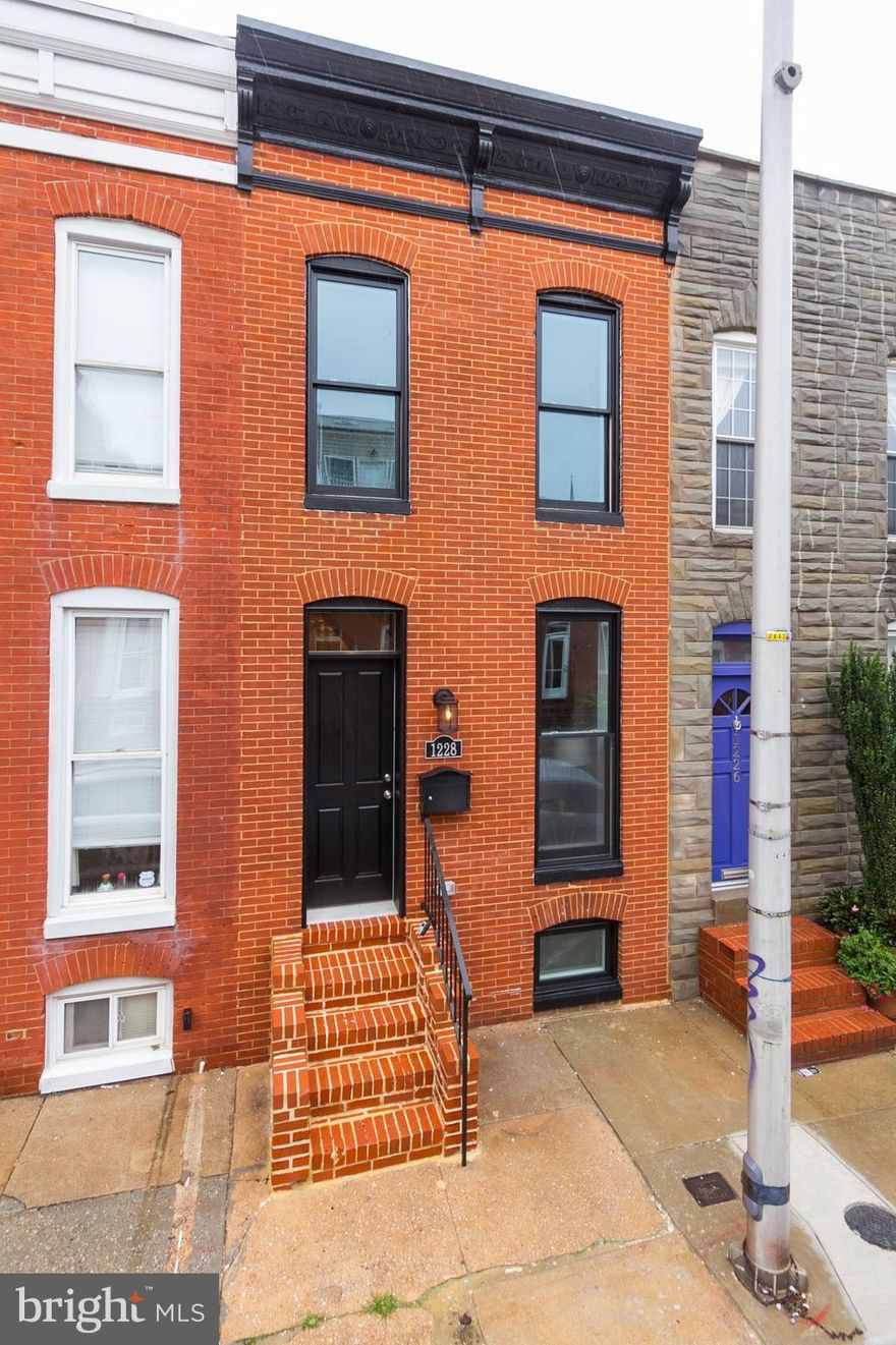 New renovation with parking! This charming home has 2BA, 3.5BA with a potential 3BR in basement and a den/office space. Gorgeous kitchen with SS appliances and quartz counters. Separate dining room, fully finished basement. Exposed brick, new hw flooring. Interior access to rooftop deck. Parking pad in rear. Great location, close to stadiums, bars and restaurants. Waiting for final CHAP approval.