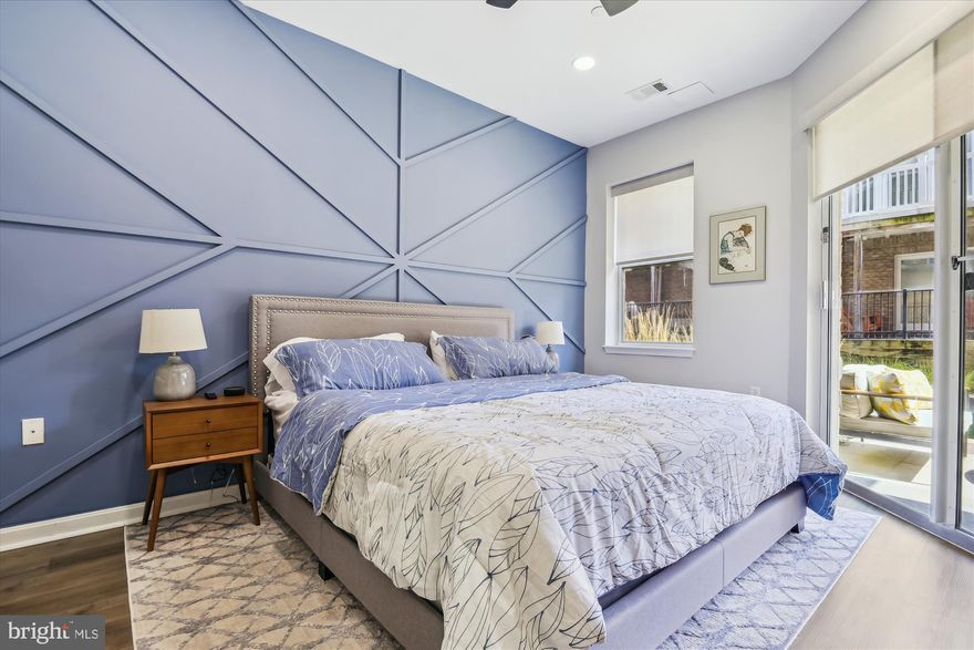 Unit T14 is truly a rare opportunity you do not want to miss. This completely renovated condominium is one of only a few located on the canal side of the building, with its own private entrance, large patio with a sight line to the harbor, and is steps from the pool. This home boasts 9-foot ceilings with new recessed lighting in the living room, bedroom, and bathroom. The kitchen has a new refrigerator, granite countertops with breakfast bar, and updated, soft-close cabinets. Unit T14 offers new, custom motorized shades, allowing you privacy and flexibility. The newly installed luxury vinyl plank flooring is professional grade and incredibly easy to clean, making it ideal for entertaining and pets. The bedroom has a new ceiling fan and modern accent wall. There are two closets that include a spacious walk-in. The completely renovated bathroom includes a limestone vanity, modern upscale tiles, a walk-in shower with tiled niche, a large linen closet, a stacked washer and dryer, a heated bidet, and exhaust fan with a built-in Bluetooth speaker. The unit has all new hardware and hinges. The amenity heavy building features a 24-hour concierge, a common courtyard, a pool with public grill access, and a fitness center. The adjacent building has a larger fitness center for the more hardcore exerciser. The attached parking garage has secure parking with this unit’s spot only steps away. The building is located conveniently to I-95 and I-83 with plenty of fantastic bars, restaurants, and activities close by. Schedule your showing, this one will not last! Parking spot in garage - P1-364