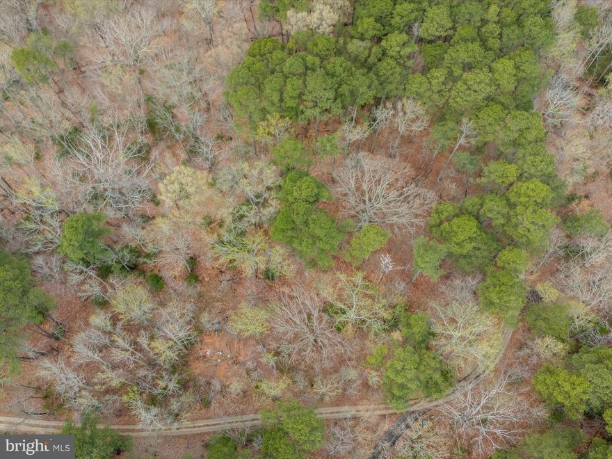 Discover the perfect blend of privacy and convenience with this wooded 1-acre residential lot in Lusby, MD. Tucked away in a serene natural setting, this flat, buildable homesite offers the ideal opportunity to create your dream home. Enjoy the peaceful seclusion of the woods while staying close to the best that the area has to offer—just minutes from Solomons Island, local shops, and major commuter routes. Whether you're looking to build now or invest for the future, this prime location provides endless possibilities. Don’t miss this rare opportunity!
