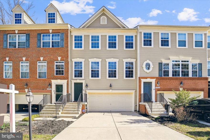 Welcome home to this spacious three bedroom, two full and two half bath,  townhouse with a two car garage. Freshly painted throughout, with brand new carpet on the lower level and upper level. Elegant hardwood floors cover the floor on the main level. Granite for the  countertops and the top to the island with seating. Stainless appliances and just installed new gas stove and microwave. From the breakfast area a slider goes to a big deck which overlooks mostly wooded area. The upper level has a fantastic primary bedroom with vaulted ceilings, a full attached bath, walk-in closet, AND a balcony out the sliding door.  Bedrooms two and three share the hall full bath. The washer and dryer are on the upper level , for convenient access to all three bedrooms. Finally the large rec room has ample space to really spread out, and a slider to the back yard.

Nestled between more urban areas the neighbor hood feels more rural but is close to shops and restaurants, and minutes from commuter routes. Close to Baltimore, Ft Meade, NSA, and Annapolis.