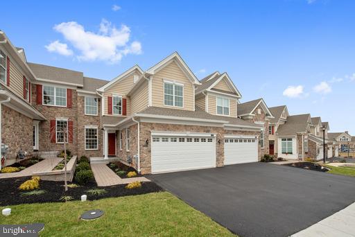 Popular Toll Brothers Vanleer floor plan available in the Regency Collection (Active Adult).  Features bright and airy open first floor with cathedral ceiling spanning Kitchen to Expanded Great Room.  Additional window above gas fireplace offer additional light to Great Room. Oversized deck installed backing to open space.  White Springs at Providence is a lifestyle community with a beautiful clubhouse and outdoor resort style pool.  This home is under construction.  Photos are not representative of this listing.