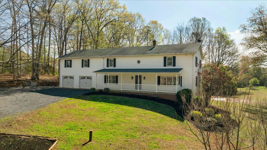 A Rare Opportunity To Own A Stunning Residence With a Private, Income-Producing Retreat- Enjoy The Good Life While Having A Smart Investment. Step in side this beautifully renovated colonial home, perfectly situated on over 2 private acres and featuring a separate, income-producing apartment above the garage. This stunning property offers 5 bedrooms, 3 full bathrooms, and 1 half bathroom, along with a 2-car garage, covered front porch, spacious deck, and an unfinished walk-out basement ready for your personal touch. Thoughtfully updated, the home blends modern style with everyday comfort, featuring fresh paint, gleaming hardwood floors, and newer carpet throughout. From the moment you arrive, you will appreciate the home’s charming curb appeal and meticulously maintained landscaping. Inside, the main level boasts a versatile and open layout, including a spacious kitchen, dining room, great room, family room, and powder room ideal for both everyday living and entertaining. The kitchen is equipped with black appliances, corian countertops, and custom cabinetry. The sun-filled great room is a true highlight, showcasing a dramatic wall of windows and a cozy wood-burning fireplace with mantel. Upstairs, the luxurious primary suite provides a relaxing retreat with its own private bath. Three additional generously sized bedrooms offer spacious closet space and share a full hall bathroom with a tub/shower combination. The unfinished walk-out basement presents endless possibilities to create a home gym, recreation space, or additional living area tailored to your needs. As a valuable bonus, the apartment above the garage includes its own private entrance and features a full kitchen, dining area, living room, spacious bedroom, and full bathroom and perfect for rental income, guests, or multi-generational living. Conveniently located near schools, shopping, and dining, this move-in ready home truly has it all. Schedule your showing today!