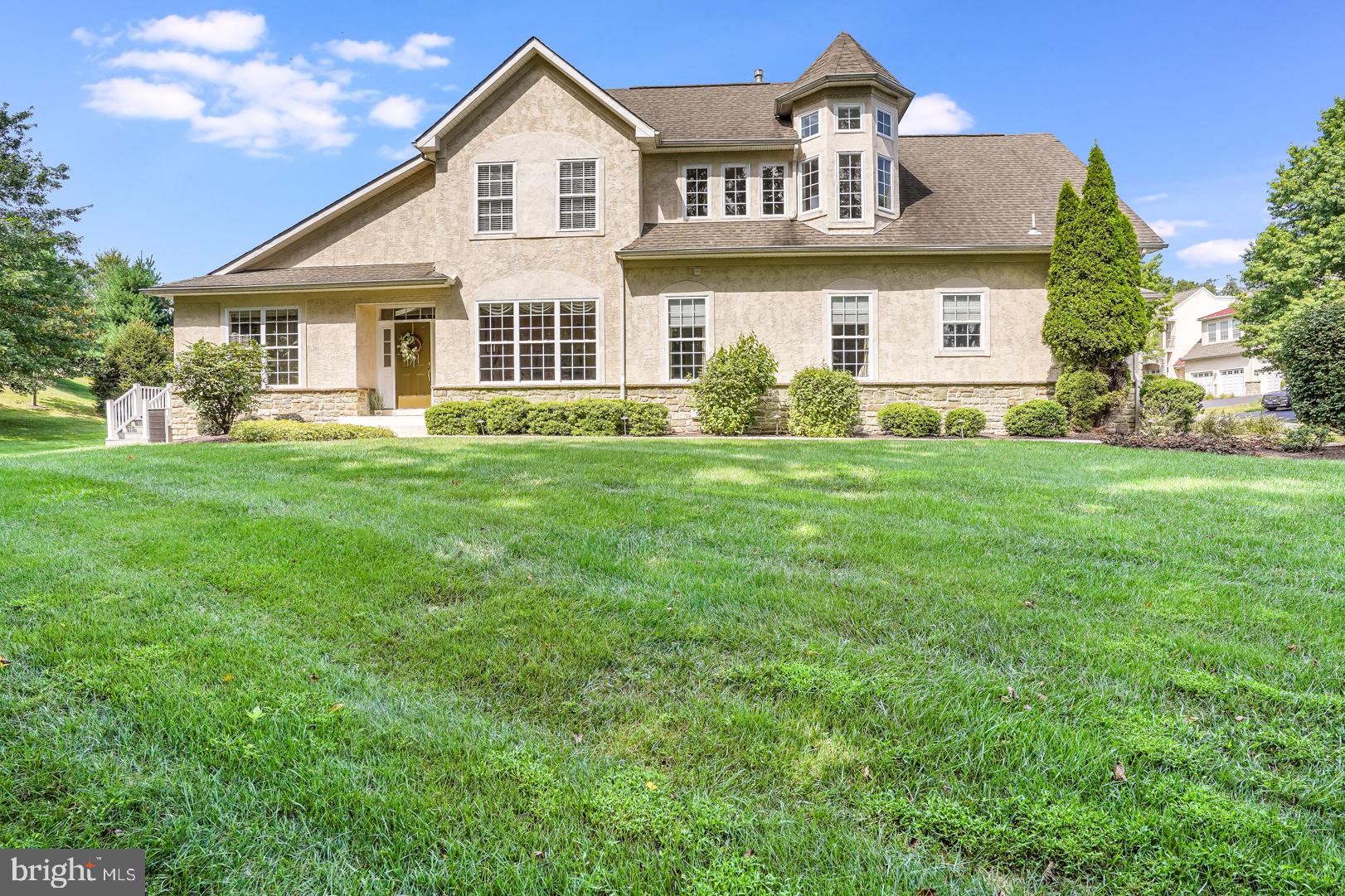 Stunning end unit Edenton Model sitting on one of the best treed locations in the popular maintenance-free community of Cherry Creek.  
As soon as you enter through the side entry, you will notice  the open floor plan, volume ceilings and gleaming hardwood flooring throughout the living areas. There is an abundance of natural light from four skylights in the Great Room. The Great Room is accented by a stunning wall-to-ceiling gas fireplace and has an additional area for a game table or reading nook with built in cabinetry. 
Adjacent to the Foyer area is a very sizable Formal Dining Room appointed with chair rail, panels and crown molding. 
 The Kitchen is a home chef’s dream with its abundance of upgraded cabinetry accented with crown molding, upgraded stainless appliances, beautiful granite surfaces and tumbled marble backsplash.  There is a breakfast bar for that quick cup of coffee or room for a table if you want a more leisurely meal. 
Entering from the Two-Car Garage is the Laundry/Mud Room with extra storage and built in utility tub. 
 The First Floor Primary Suite is spacious and bright, accented by a  tray ceiling and crown molding with two incredibly large custom walk in closets. Most impressive is the luxury bath with ceramic flooring, a Roman Arch over the jetted tub, double vanities and exquisite ceramic tile shower with glass enclosure. 
As you walk to the upper level you will first see the expansive loft which allows for so many possible uses. Study, office, library, exercise or family room.  However, you will be most drawn to  the Turret of Windows, a remarkable corner of the loft for reading, meditating or just enjoying the peaceful window views.  
There are two bedrooms with wall-to-wall carpeting and large closets plus a bonus room or fourth bedroom with a skylight and extra storage. Rounding out the upper level is a Full Bath appointed with neutral tile and large vanity. 
 Lower Level has roughed in plumbing, HVAC, an egress window and higher ceilings for future finishing. 
The quiet Cherry Creek Community is surrounded by 80 acres of protected land that has walking trails as part of the Brandywine Conservancy but is so close to all the conveniences of shopping,( Wegmans, Giant, Whole Foods), Upscale Restaurants, Public Transportation and Entertainment with easy access to all the major highways.  
This outstanding home is one of those rare opportunities not to be missed.