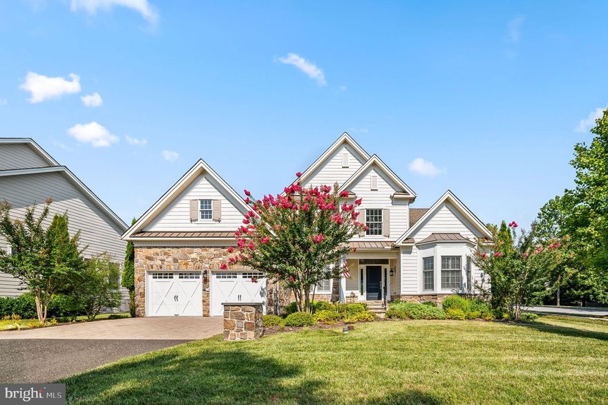 Seize the opportunity to own a stunning single-family home in the coveted Liseter community. This elegant Palmerton model from the Merion Collection sits on a desirable corner lot, boasting picturesque views of open space and a serene pond. Enjoy the convenience of being within walking distance to the clubhouse, pool, and exercise facility.
The home features a first-floor primary suite and a bright, open floor plan ideal for both family living and entertaining. A grand two-story entrance hall with a sweeping staircase sets the tone, complemented by exquisite hardwood floors that extend throughout most of the first floor. Wainscoting enhances the hall, staircase, Living Room/Study, and Dining Room.
The Living Room/Study is adorned with a charming bay window, plantation shutters, and elegant detailing including hardwood floors, wainscoting, chair rail, and crown molding. The formal Dining Room echoes this sophistication with similar features.
The Center Hall  accesses  a private Powder Room with pedestal sink and guest coat closet and also leads to a dramatic two-story Great Room, complete with a gas fireplace and traditional Morgan Mantel. Adjacent is the beautiful white kitchen, featuring a stunning quartz backsplash with coordinating countertops, under-counter lighting, and an oversized island with seating. Top-of-the-line stainless steel appliances include an LG refrigerator, Kitchenaid gas cooktop, convection wall oven, microwave, dishwasher, and a Whirlpool garbage disposer. The kitchen flows into a lovely breakfast area with a brushed nickel chandelier and a cozy Sunroom/Den, which offers two walls of windows and a French door leading to an oversized Trex deck with a pergola and steps down to the rear yard with mature trees.
The spacious primary suite boasts a coffered ceiling and double doors leading to a newly renovated primary bath. The bath features stunning porcelain floors and wall tiles, a seamless glass shower, a separate vanity area and double white vanity and two sinks, a commode room, and a custom walk-in closet by Closet by Design.
Completing the main level is a large laundry room with cabinetry, a spacious kitchen pantry closet, rear coat closet, and access to the two-car garage. On the second floor, you'll find two generously sized bedrooms with walk-in closets and a full bath with a tub and shower. The lower level is unfinished but includes an egress window, providing ample storage or the potential for additional living space.
This prime location offers proximity to shopping, train stations, and a wealth of amenities, including walking trails, two clubhouses, an exercise facility, basketball, tennis, and pickleball courts, a beautiful pool, and numerous social activities.