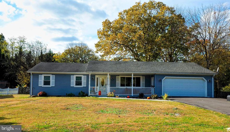 Welcome to this charming ranch style home featuring a private living  room and a large kitchen/dining/family room with access to a covered deck and plenty of play and garden area in the fenced in backyard.   Primary bedroom with bath and 2 additional bedrooms and full bath. Off the kitchen is a great laundry room with access to the backyard and the 2 car attached garage!