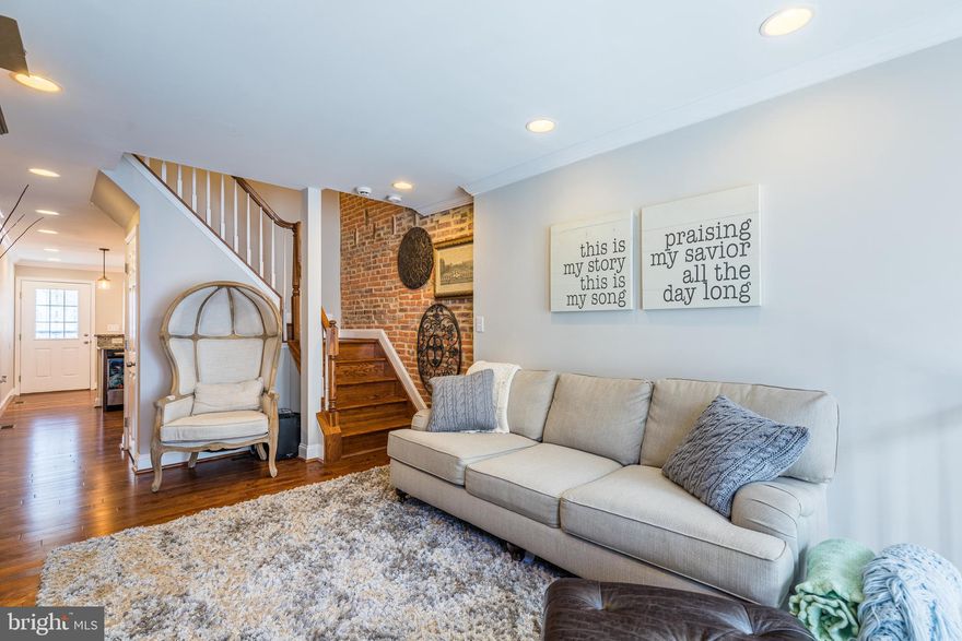 Welcome to 6 N Rose, uniquely designed and renovated home only steps away from the luscious greenery of Patterson Park. This home was fully renovated with excellent attention to detail offering 2 master suites, lower level den with a half bath, as well as the most coveted rear PARKING PAD. The main floor features an airy and inviting living room with gleaming solid hardwood floors and crown molding, leading you into the chef's eat-in kitchen with gorgeous solid java maple cabinets, stainless steel appliances, and exotic White Diamond granite countertops. Second level offers two master suites: spacious bedrooms with generous closets, tray ceiling with under-lights, and a walk out to a private balcony from the rear master suite. Lower level is fully finished and could be used as a den, home office or guest quarters with its own powder room. All of the major systems have been updated and serviced, giving the new homeowner peace of mind. This home is located within walking distance to Johns Hopkins, short distance to Fells Point, Canton and Harbor East, easy drive to I-95 and I-895.