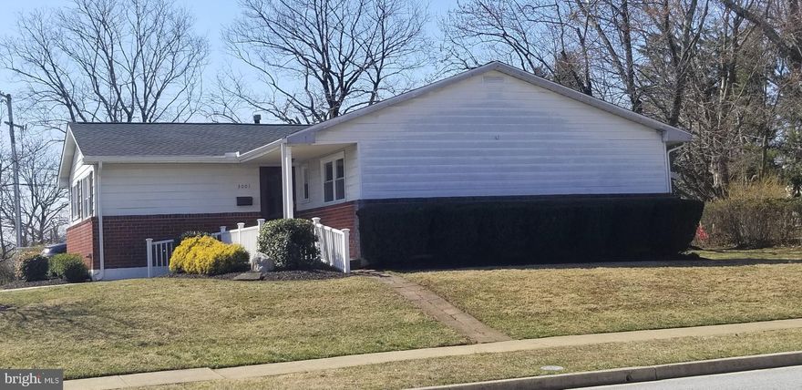 Spacious brick rancher in most desirable County location.  This house features  an open floor plan, wood floors, replacement windows, newish roof and HVAC.   Full lower level with large bedroom, half bath and huge family room. Must see!