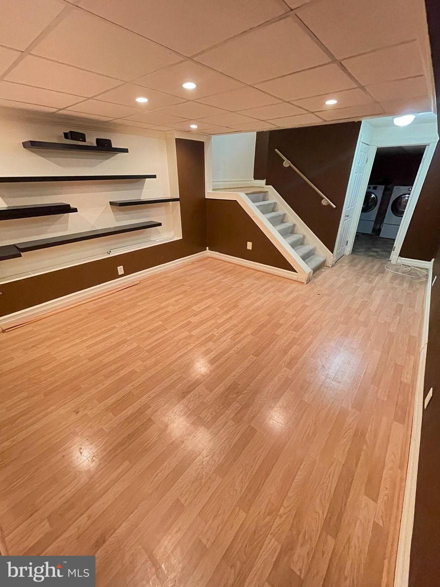 This beautiful 4 bdr 1.5 bth twnhome with huge bump out is located near Hollins Market and UMD
Medical Ctr. This home includes updated ktchen with SS appliances, closed in patio off kitchen.
Beautiful hardwood floors, master bdrm suite on upper level, finished lower level, rear parking pad and more.