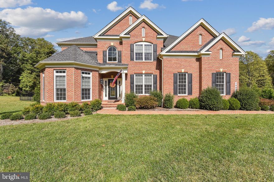 Welcome to 14421 Maple Ridge Court in Baldwin, Maryland. Absolutely stunning and meticulously designed, this luxury home is a true masterpiece. Nestled in the exclusive Weatherstone Community, this property offers contemporary elegance and timeless sophistication. Boasting 4 bedrooms and 2.5 bathrooms, this spacious abode is ideal for families seeking both elegance and functionality. 
Step into a world where every detail has been carefully considered. From the moment you enter the grand foyer, you'll be enveloped in luxury. Stunning white tile floors, and a grand curved staircase greet you as you make your way into this elegant home w/ Main level bedroom with double door entry, and hardwood floors. Office area with upgraded, double french doors, perfect for those working remotely, (Poss 5th bdrm).  Experience the grandeur of this residence with a 2-story family room that exudes a sense of spaciousness and elegance, and fills the heart of the home with natural light and warmth. Hardwood floors and a floor-to-ceiling, brick fireplace adorn this captivating space. A secondary staircase in the family room leads upstairs to a spacious, open loft area that overlooks the family room. 
The open concept of the home joins the family room with the gourmet kitchen; a culinary dream! Featuring top of the line stainless appliances to include double wall ovens, ample upgraded white cabinetry, large pantry, custom tile backsplash, quartz countertops, and a spacious island for entertaining. Host your guests in this fabulous space, or take a few steps into the formal, combination living and dining room, complete with upgraded hardwood floors, elegant crown and ornamental molding, and chair rail.
The main level of this exceptional home also features a large powder room and a laundry area that's designed with your convenience in mind. Ample space, granite counter, sink and additional thoughtful features, makes your laundry a breeze. 
In the upper level of this exquisite home, the spacious floor plan offers the perfect blend of comfort, style, and tranquility.Here you’ll find a full bathroom with a double vanity, upgraded tile and fixtures. Two well appointed bedrooms to suit your family's needs, whether for kids or guests, and a spacious, open loft overlooking the family room. Then there’s the Primary Suite; a true sanctuary. Relaxation and comfort await you in this sprawling and well-thought layout. An expansive custom closet with ample room for your wardrobe, and sitting area make this a perfect retreat after a hard day. The spa-like en suite is designed with attention to detail and features high-end finishes throughout, it features luxurious and sleek, custom tile, a soaking tub, oversized shower with bench, double vanity and private “water closet”. 
The unfinished basement was outfitted with an additional large pantry and/or storage area. Offering endless potential, this blank slate awaits your creative vision to transform it into the ultimate sanctuary. Whether it's a state-of-the-art home theater, wine cellar, a home gym, or a combination of these and more.
With high ceilings, generous square footage, and a “rough-in”, this is an unparalleled opportunity to customize your lower level living space to perfection. 
This stately home is situated on a premium lot, with a shared driveway onto a secluded cul-de-sac. The generously sized driveway and two-car garage offer an abundance of parking options. With nearly three and a half acres of  partially fenced, pristine land, and backs to Gunpowder Falls, this magnificent home boasts a remarkable outdoor oasis in a serene and private setting. Perfect for those seeking a connection with nature in the comfort of their own home.
An expansive, maintenance-free deck and flagstone patio are perfect for year-round entertaining and relaxation. This home offers privacy and tranquility while being just minutes away from top-rated schools, fine dining, shopping, major highways and attractions.