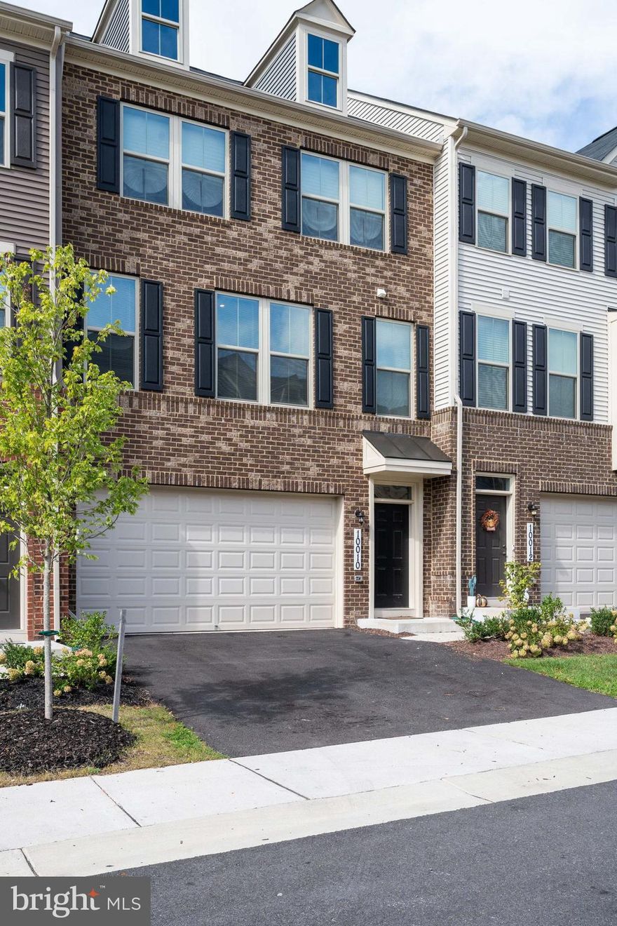 Brick Front McPherson Model Townhome  - like new!  Upgraded Gourmet Kitchen to include 10 ft island, all the bells and whistles for the cook in you, double oven and gas cook top! Conveniently located nook off the kitchen for your mini office, large spacious dining area along with oversize living room,  powder room off the living room.   Master Bedroom with large walk-in-closet to accommodate all-season clothing, master bath has double vanities and luxurious shower.  Two additional bedrooms and laundry room conveniently located next to hall bath.  Lower level offers a  4th bedroom  or set up as a family room with access to the rear and a bonus room for an office or additional storage.    Due to Covid-19; please follow proper procedure...wear mask and remove shoes or put on booties.  PLEASE TAKE USED BOOTIES WITH YOU.