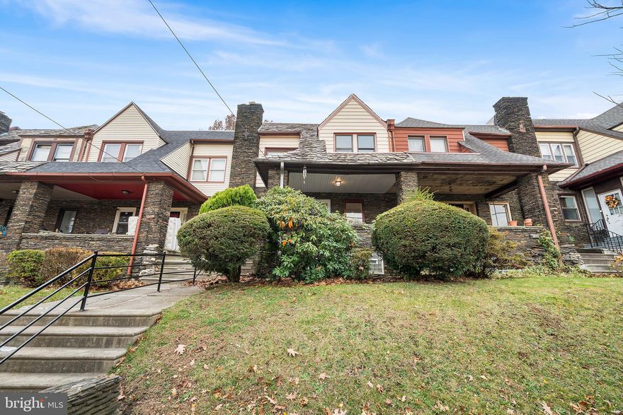 Welcome to 6630 Boyer Street, a bright and spacious home located on a quiet, tree lined block in East Mount Airy. The main level offers a cozy living room with a decorative fireplace, open dining area, and an updated kitchen, all complemented by refinished original hardwood floors.

Upstairs features four comfortable bedrooms and two bathrooms, including a primary en-suite with dual access from the bedroom and hallway. A second full hall bath sits directly behind it, creating a practical back-to-back layout that serves the entire upper level well.

The finished basement provides extra space with a bonus room and third full bathroom, laundry area, and walk-out access, ideal for  guests, work, fitness, or additional living needs. An attached garage and convenient access to Lincoln Drive, parks, cafe's, and transit complete the picture.

Use your vision to make this home your own. It offers plenty of space and a reliable layout in a great Mount Airy location!

Note: Fireplace is currently non-functional; fire in photos is AI generated. The existing opening allows for an electric insert or vent-free gas logs for future use if desired.