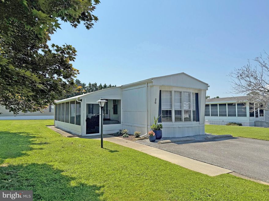 3 miles to the Rehoboth boardwalk. Make this your year-round home or the best vacation get-away ever! Tastefully remodeled in 2023-2024. Luxury vinyl plank flooring throughout. Vaulted ceilings give the kitchen and living room an extra spacious feeling. The eat-in kitchen was nicely remodeled. It features granite countertops, subway-tile backsplash, and a newer stainless-steel appliance package. The appliances include a dishwasher, smooth-top electric range, built-in microwave, and a refrigerator with ice maker. There is a garbage disposal, too. The kitchen also has a little built-in desk next to the dinette area where you can review your recipes or make your entertainment. The main bedroom is to the rear of the home, and it has a private door into the shared hall bath. That bath has a tub/shower and a single-sink vanity. The second bedroom is just down the hall from the laundry area, which includes a full-size washer and dryer. You are going to love the Silvertop screened porch for relaxing days after the beach or pool.  Outdoor storage shed. 200amp electric panel. Electric forced air heat. New Central AC in September 2025 and three ceiling fans: one in the living room and one in each of the two bedrooms.  Newer neoprene/rubber roof. Near the community pool. And Silver View Farm is close to the beaches, shopping, & restaurants. The DART Bus Park-n-Ride is just down the road if you don’t feel like hunting for parking at the beach. Annually renewable leasehold interest: Lot Rent of $723.00/mt. includes water & trash/recycle service (Lease renews annually on Jan. 1 with any increase capped per law – 25 Del. C. Sec. 7050-7054). Homeowner pays electric, sewer, cable/Internet (Xfinity) & lawn service. Silver View Farm allows 2 pets. Pool membership is optional (approx. $175/person with discounted group packages). A Park Application ($72/person) is required for all adults who will occupy the home for 14 or more consecutive days. Buyers are accepted as a Resident in Silver View Farm based on the following criteria: 1.)income verification, 2.)high credit bureau score, 3.)evaluation of debt-to-income ratio, and 4.)criminal background check. Note: Rentals are NOT permitted in this community - but friends & family are welcome to visit you. Financing may be available to qualified borrowers from only a very few Lenders that specialize in installment/chattel loans for manufactured homes on leased land. Closing costs will include a 3.75% “real estate transfer tax” (DMV Doc Fee) & a Settlement Agent Fee.