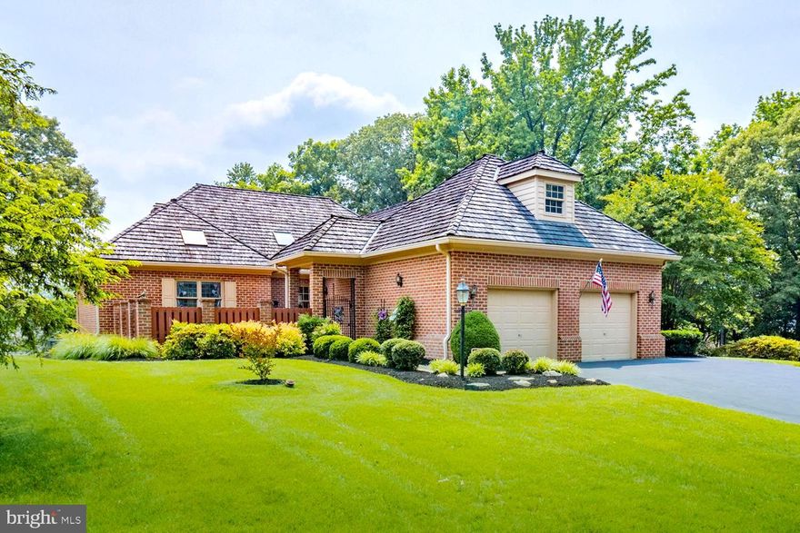 SHOWCASE FRENCH COUNTRY HOME in AMENITY RICH, WATER PRIVILEGED SOUTH RIVER LANDING!  Bask in a resort lifestyle in this 24/7 secure gated community offering South River marina accessing the Bay, community pier, pool, tennis, and wooded picnic & play areas, walking trails, and common grounds.  Lushly landscaped CORNER LOT home celebrating the seasons with main level wraparound dining deck & 2 lower Bedroom patios!  Iron dragon gate entry into Japanese-influenced courtyard.  Elegant marble Foyer foreshadowing the MASTERFUL DETAILING & UPDATES within including lustrous wood & tile floors, skylights, 3 fireplaces, and renovated Baths. Palladian window Living Room stepping up to formal Dining Room.  Dine-in Kitchen w/custom cabinetry, carved skylight canopy, and chef’s cooktop island/dining bar. Shared fireplace ambiance with adjoining Family Room!  Main level, deck accessible Primary BR Suite offering walk-in closet & ensuite luxury Bath.  Lower level 2 Bedrooms each with ensuite Bath & covered verdant-view patio!  Glassed Rec Room w/gathering fireplace & custom bar.  Handsome Billiard Room!  NEGOTIABLE piano & billiard table!  Multi-vehicle driveway parking; roomy 2-car garage.  Mere minutes to daily catch restaurants, Westfield & Towne Centre Malls dining/shopping, downtown Annapolis City Dock, the USNA, and commuter RTs 2/50/97.  COMFORT & STYLE IN DIVINE HARMONY!