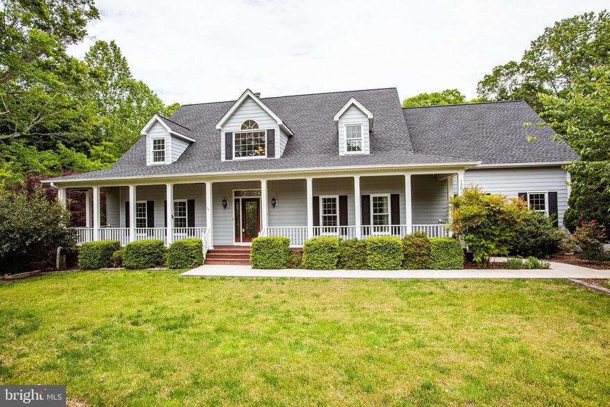 Beautiful home on a private 2+ acre wooded lot located on a quiet cul-de-sac.  This stunning Cape Code has a huge front porch and side loading garage giving it quite the curb appeal.  Inside find a main level master bedroom and bathroom with huge walk in closet.  The spacious kitchen features a wall oven, island cooktop, energy efficient appliances and granite countertops.  The family room features a beautiful stone fireplace with hardwood and ceramic tile floors throughout the main level.  Upstairs there is an additional master bedroom along with 3 more bedrooms and a bonus loft space.  The partially finished basement has a fireplace, exercise room and game room.   Outside there is a work shop and shed on the impeccably landscaped property.  This is a must see! No HOA!