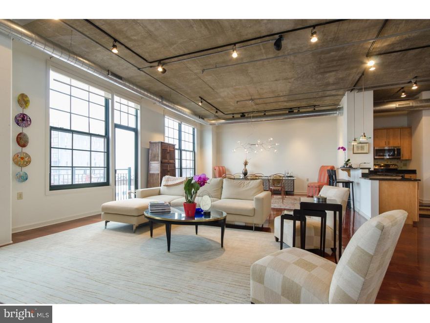 Spacious 3 bedroom, 2 bath penthouse condo in The National - building 5. 2 balconies and 2 car self-parking spaces #99 and #100 near the elevator. This unit features a wide open living room, dining area and kitchen layout with a wall of windows facing East, beautiful hardwood floors, high ceilings and glass door to balcony. Custom kitchen offer maple style cabinetry, granite countertops and new stainless appliances, plus a wine cooler and rack with coolly back lit bar counter. Master suite with multiple closets with built-ins, including a walk-in closet, small balcony and 4 piece bath with whirlpool tub, stall shower and double sink granite vanity. This homeowner updated both bathrooms, installed new refrigerator, range, microwave and washer/dryer.