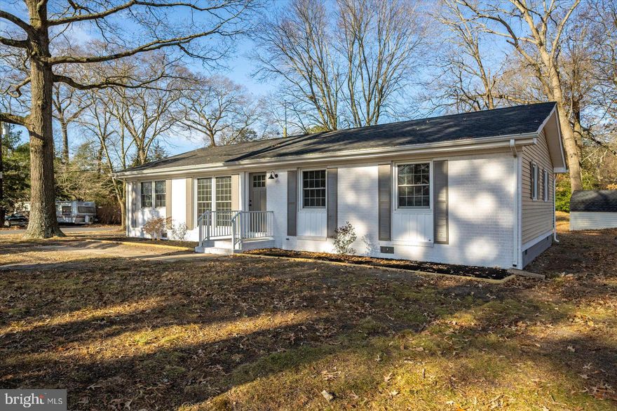 Come take a look at this newly remodeled home on a quiet neighborhood corner lot.  As a bonus, the property sits across the street from Winterplace Park and all its amazing amenities and activities.  You'll find this home features hardwood floors, replacement windows, new roof, all new kitchen and bath cabinetry.  Within the home, you will also find custom tiled bathrooms and kitchen backsplash, stylish granite kitchen countertops, luxury waterproof flooring, and even a sunroom room for entertaining.  The home contains 4 bedrooms to go along with 2 full bathrooms.  The entire home boasts a matte black theme which carries throughout from doorknobs to plumbing and electrical fixtures.  The new owner should also be prepared for reoccurring savings as this property has no city taxes.  If additional storage is needed, the property also contains two generously sized sheds in the rear of the property.  Recent passing septic inspection available upon request.  Grab this home before its gone!