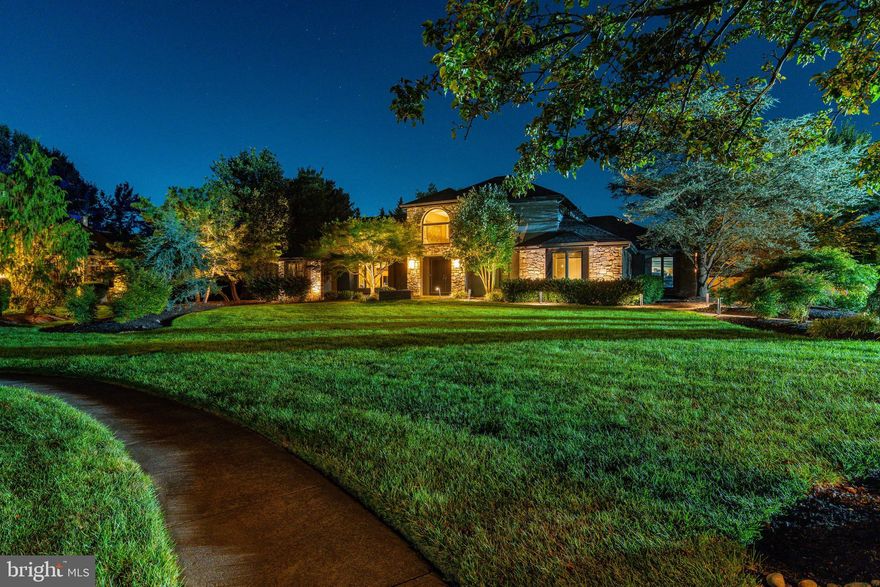 A truly special home in a truly spectacular setting! Perfectly positioned on a quiet cul-de-sac in Horsham Township, this striking 4-bedroom, 4.5-bath contemporary offers over 3,700 square feet of bright, beautifully balanced living space. With clean architectural lines, an open layout, and extensive smart-home upgrades, this residence combines modern design with everyday comfort. A dramatic two-story foyer with a curved staircase and circular wet bar sets the tone for entertaining. The sunken family room, anchored by a gas fireplace, flows effortlessly into the light-filled sunroom, where walls of glass overlook the private backyard and resort-style pool. Outdoors, the heated, app-controlled saltwater pool and spa take center stage—framed by professional Lutron landscape lighting, SunDek patios, and a Lynx outdoor kitchen ideal for summer gatherings. A German-engineered patio umbrella, PVC privacy fencing, and lush, mature landscaping create the perfect retreat for entertaining or simply relaxing. Tech-forward features include Lutron smart lighting (voice-controlled via Alexa), whole-house audio, enterprise-grade Ubiquiti Wi-Fi, three-zone HVAC with app-based thermostats (2022/2023). A fully automated Generac generator provides peace of mind, capable of powering critical systems such as key lighting, the refrigerator, and garage doors—ensuring comfort and security regardless of what Mother Nature throws her way.  Enhancements also include the newer Marvin doors and windows, Roof (2020), Hunter Douglas power shades, heated primary bath floor, and a whole-house water filtration and softening system all add up to making this a worry-free home The finished lower level extends the fun with a dedicated movie space complete with projector, screen, and tiered seating—perfect for cozy family movie nights or weekend football. Upstairs, a loft gym area provides a bright, open space for workouts or yoga, offering a seamless balance of wellness and entertainment. A three-car garage and spacious driveway provide ample parking and storage for multiple vehicles and recreational equipment—add in the car charger and this is ideal for today’s active (and energy efficient) lifestyle. The location is equally impressive: steps from Mondauk Park, a hop, skip and a quick jump to the Ambler YMCA, and just minutes from The Promenade at Dresher, home to Starbucks, Fresh Market, Lululemon, and multiple dining and shopping options. Offering the sophistication of contemporary architecture with the ease of main-level living, this home is as smart as it is stylish—where every detail has been designed for comfort, connection, and enjoyment. Don't miss the chance to call this home YOURS! Call for your showing TODAY!