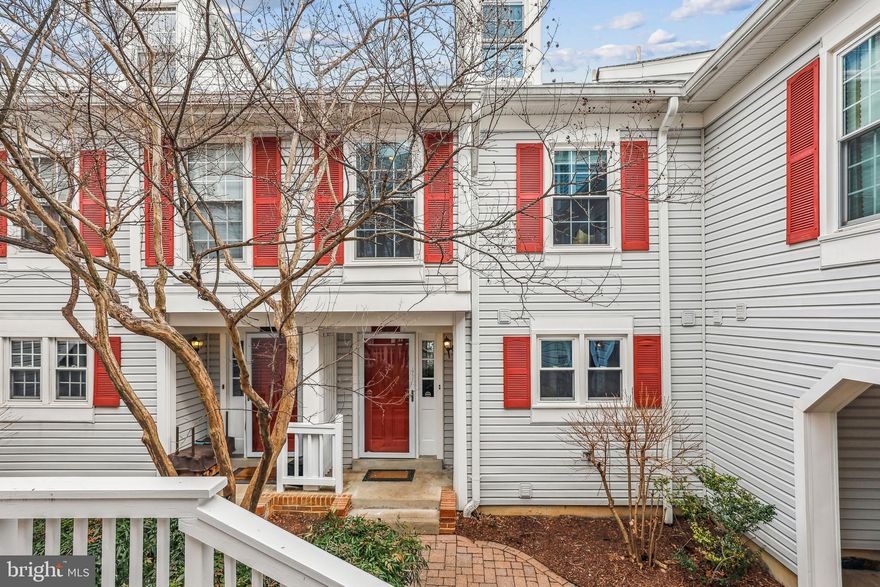 Welcome home to this three level, light and airy two bedroom plus loft in Courtbridge!  Brand new kitchen with quartz countertops and stainless steel appliances, including an induction range.  Living room with fireplace and door leading to one of two private balconies.  Separate dining area.  Spacious primary suite with door opening onto a private balcony.  Second bedroom features lovely built-in bookshelves and seating.   Bonus third level with half bath is perfect for home office.  Great storage.  Cute courtyard setting.  Wonderful pool.  Loads of parking.   Windows and doors replaced 2019, flooring 2021, carpet 2025, HVAC compressor and handler 2018, hot water heater  2022.  Walk to shopping and dining at The Village at Shirlington.   Close to bike trails, public transportation and Shirlington's dog park.  Fantastic opportunity to love in a close in community!  Don't miss!