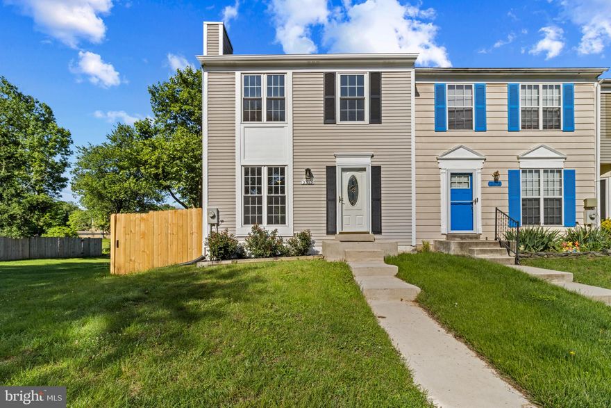 Welcome to your perfect blend of comfort, style, and convenience in this beautifully updated end unit townhome! With only one adjoining wall, you'll enjoy extra privacy and an abundance of natural light throughout the home.

This spacious 3-bedroom, 2-bathroom residence has been thoughtfully refreshed with fresh paint throughout and features two fully renovated bathrooms that add a modern touch. The main level invites you in with warm wooden floors and a cozy fireplace, perfect for relaxing evenings or entertaining guests.

Downstairs, the finished basement continues the hardwood flooring and offers a separate laundry room plus a walk-out exit for added functionality and space. Step outside to your private fenced backyard with a deck, ideal for morning coffee, summer barbecues, or simply unwinding in your own outdoor retreat.

Enjoy the unbeatable location with a park just a short stroll away.  Bowie Town Center is only a few minutes' drive away from your home, offering shopping, dining, and entertainment options at your fingertips.

This move-in ready gem is available to be viewed—schedule your tour today and fall in love with your next home!